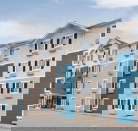 WoodSpring Suites Fayetteville Univ. of Arkansas - Orlando Tourists