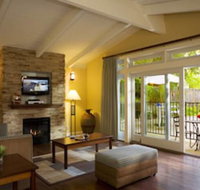 Red Cottage Inn  Suites - Orlando Tourists