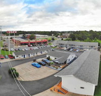 Travelers Inn and Suites - Orlando Tourists