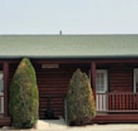 Wolf Den Log Cabin Motel and RV Park - Orlando Tourists