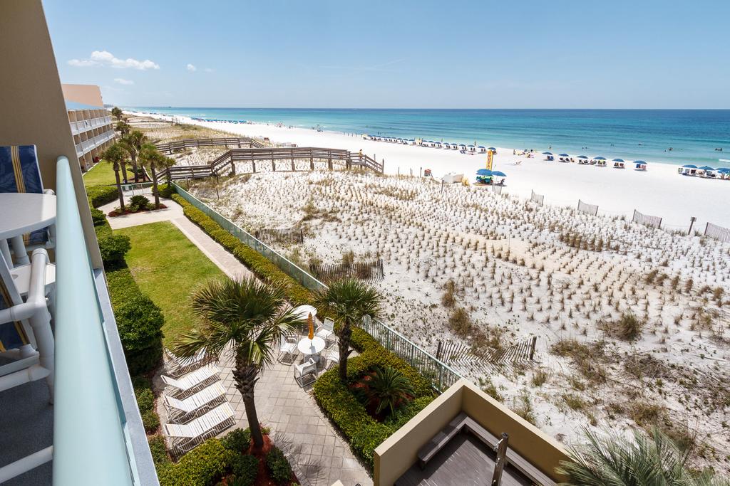 Pelican Isle 309: UPDATED FLOORING, Beautiful 4th Floor, FREE BEACH SERVICE - thumb 1